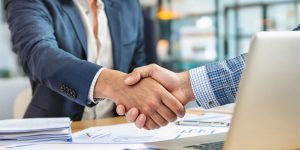 Entrepreneur consulting with a financial advisor for funding.